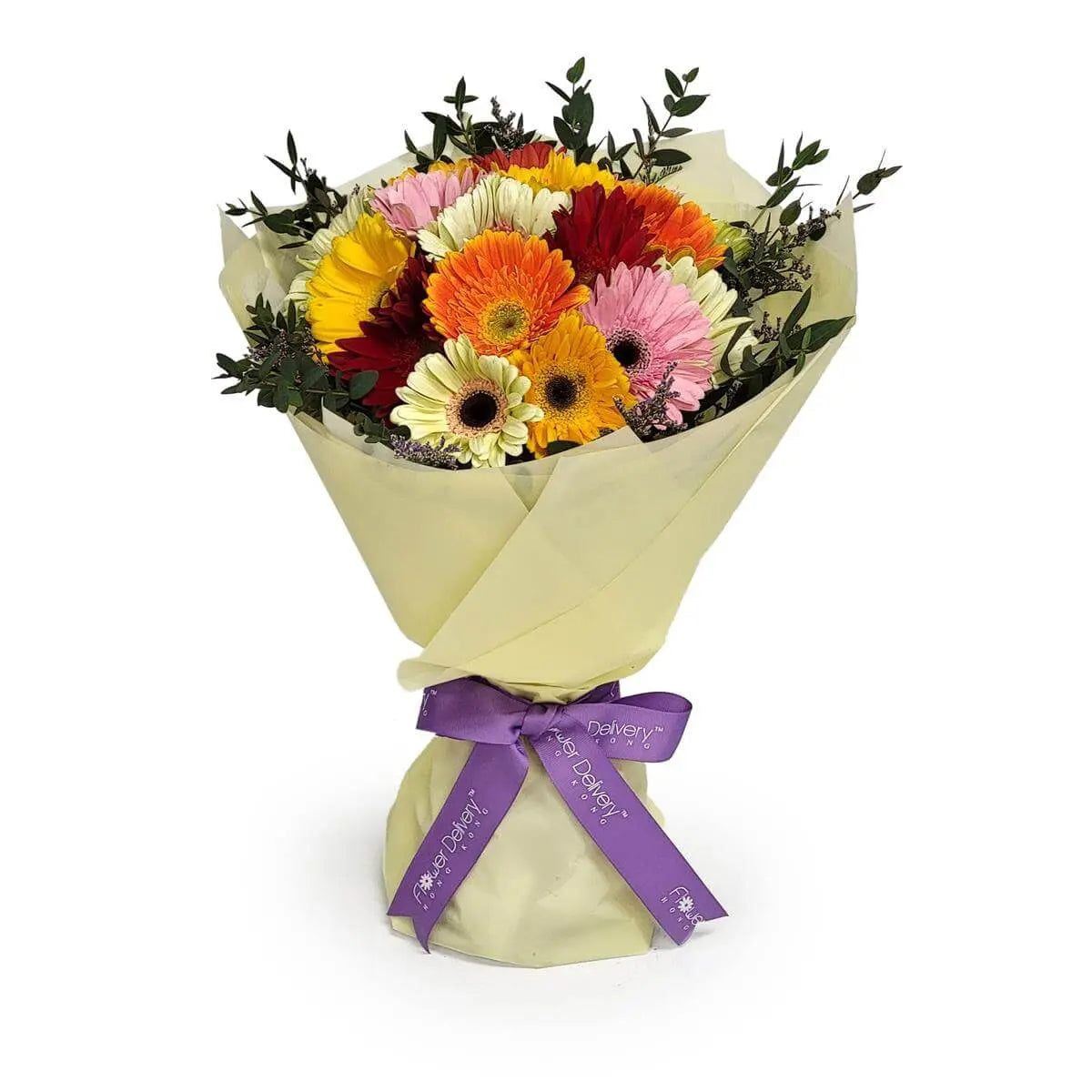 Bright bouquet of multicolored gerbera daisies in red, yellow, orange, pink, and ivory with assorted greenery | 豐富色彩的非洲菊花束,包括紅、黃、橙、粉與奶白色,搭配多款綠葉,淡黃包裝與紫絲帶細緻包裹。