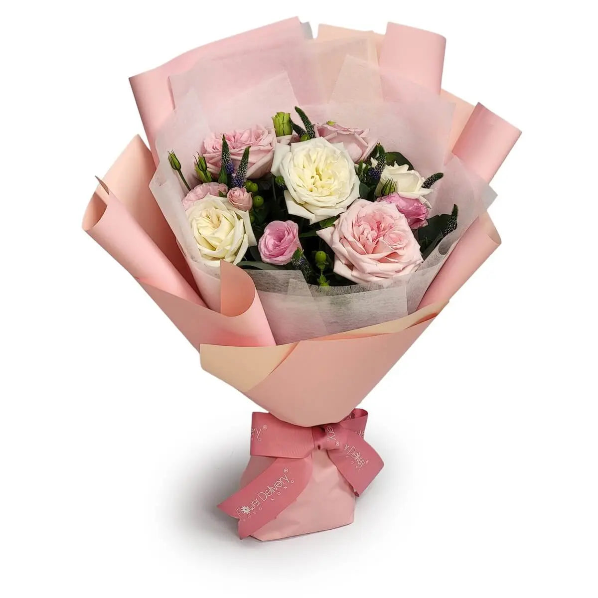 Hand-tied bouquet of pale pink roses, white garden roses, pink lisianthus, and green berries in layered pink wrap | 手綁花束包括粉紅玫瑰、白花園玫瑰、粉紅桔梗與綠色漿果,粉紅包裝襯托