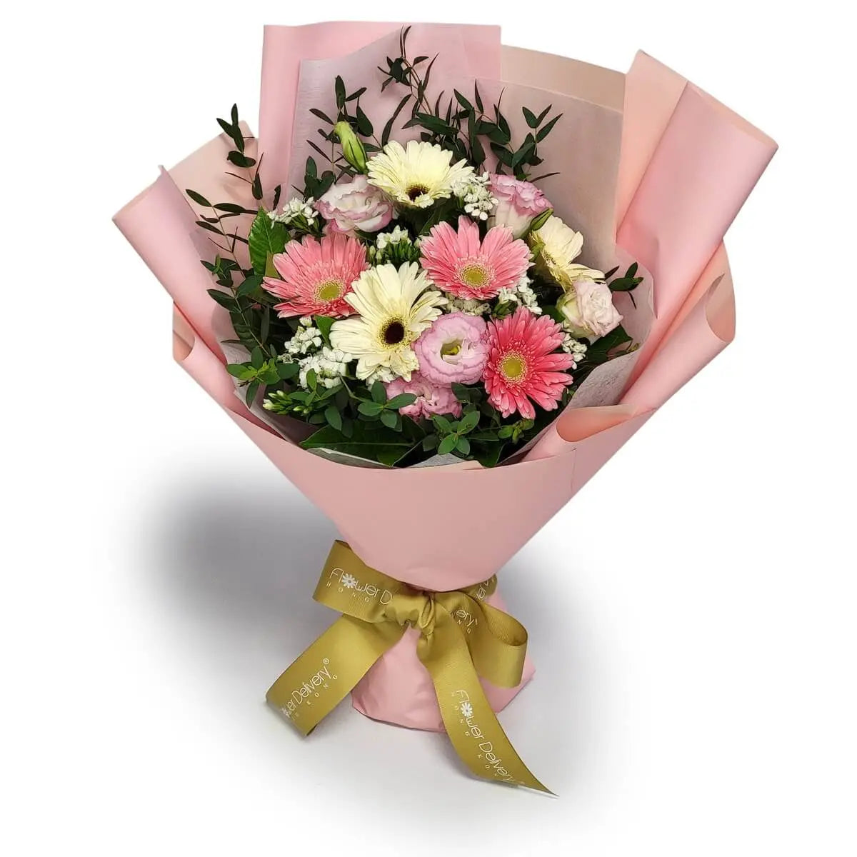 Lively mix of pink and buttery gerberas, pastel pink lisianthus, white filler flowers, and fresh greens in blush pink wrapping | 粉紅與奶黃色非洲菊,淡粉桔梗與白色小花點綴,搭配嫩綠葉材與柔粉包裝。