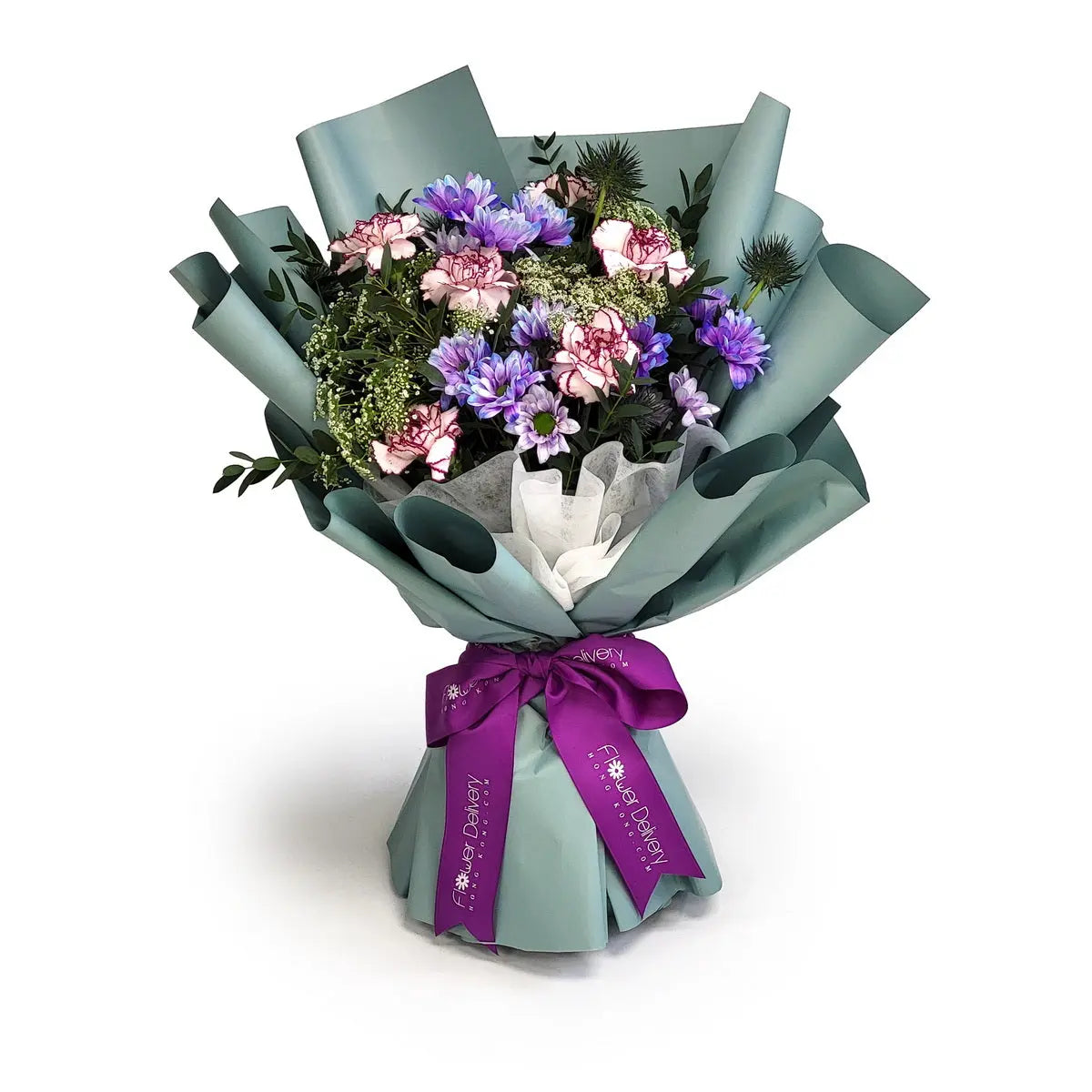 Arrangement of lavender-blue chrysanthemums, ruffled bi-color carnations, spiky eryngium, and green filler flowers in sage wrap with purple ribbon | 薰藍色菊花、波邊雙色康乃馨、藍松球與翠綠配花,配鼠尾綠包裝及紫色絲帶。