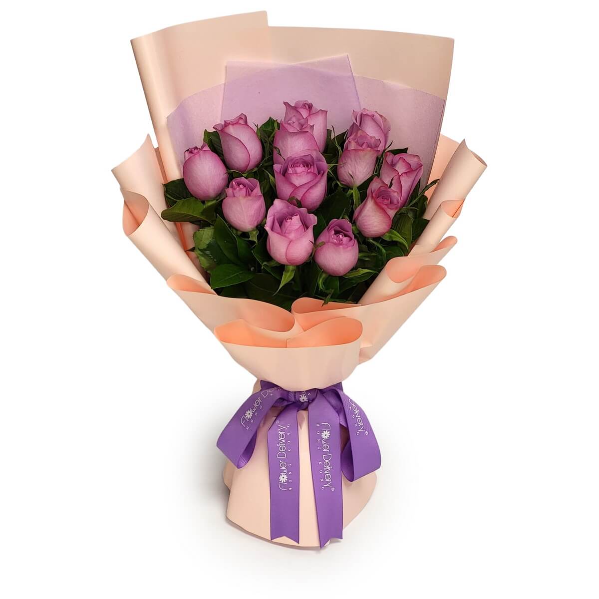 Hand-tied purple rose bouquet with fresh green foliage, wrapped in layered blush paper, full bouquet view on white background. 紫色玫瑰花束,層次包裝