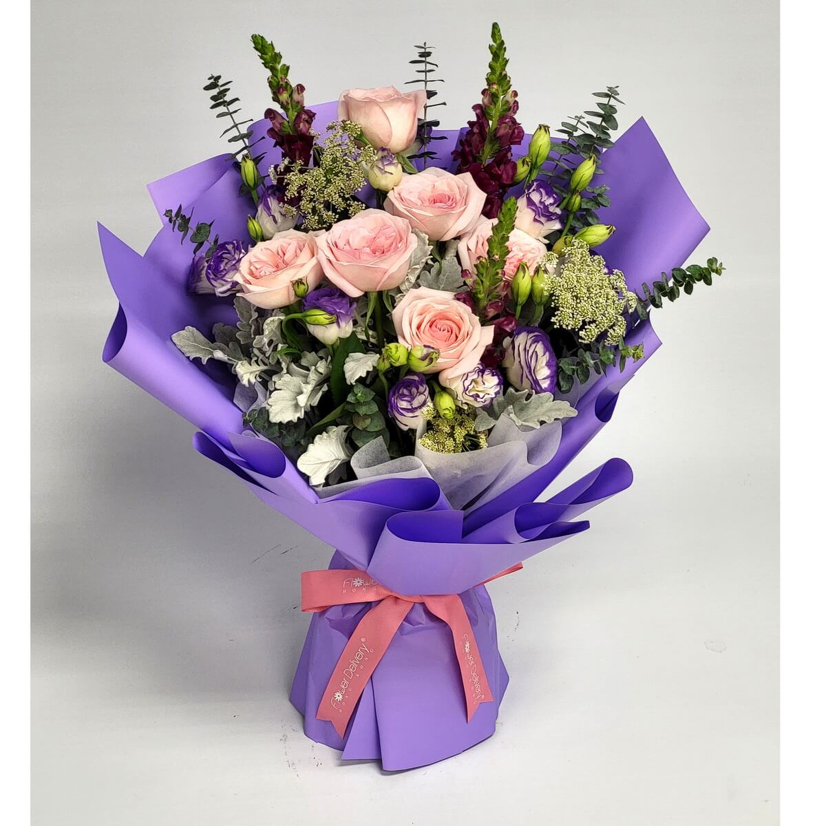 Original photo of hand-tied bouquet with pink roses, bi-color purple lisianthus, burgundy snapdragons, queen anne's lace, and dusty miller foliage in lavender wrapping - 粉紅玫瑰、紫白洋桔梗、酒紅金魚草、蕾絲花及銀葉菊配薰衣草色包裝的手綁花束