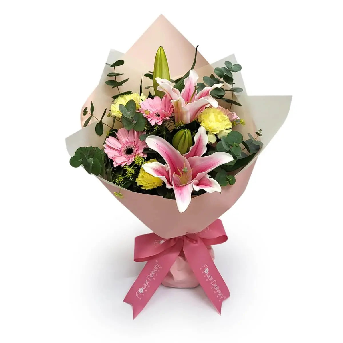 Arrangement of pink lilies, gerberas, and yellow carnations with eucalyptus greens, wrapped in soft pink paper and tied with a satin ribbon | 粉百合、粉菊與黃康乃馨,配尤加利葉及粉紅絲帶包裝。