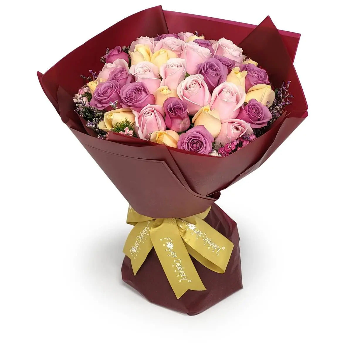 Bouquet of mixed pink, lavender, and champagne roses with small filler blooms, wrapped in deep red paper and tied with a gold ribbon | 粉紅、紫及香檳玫瑰配小配花,深紅包裝並綁金絲帶。