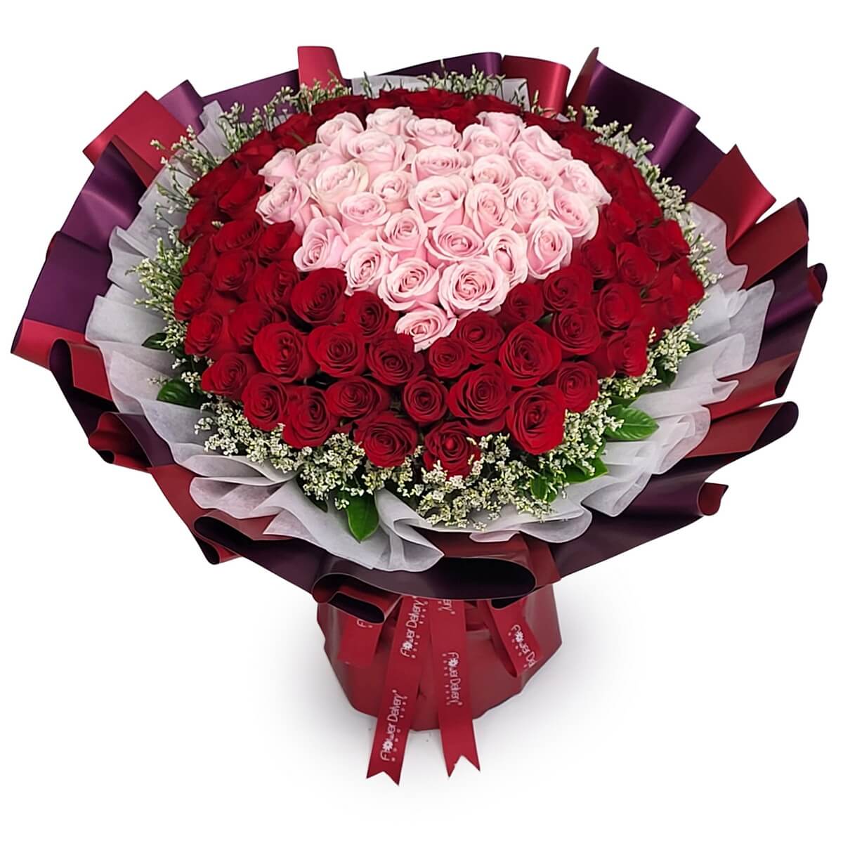 Heart-shaped arrangement of pink roses bordered by red roses and baby's breath, wrapped in multi-layered burgundy paper | 心形粉玫瑰中心,紅玫瑰與滿天星圍繞,包以多層酒紅花紙