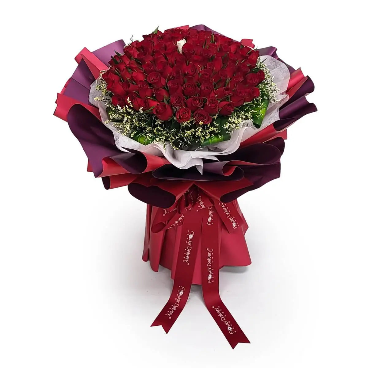 Abundant bouquet of deep red roses with baby’s breath and a single white rose at the center, wrapped in multi-layered red and purple paper | 鮮紅玫瑰配滿天星及中央白玫瑰,紅紫層次包裝紙包裹成大型花束