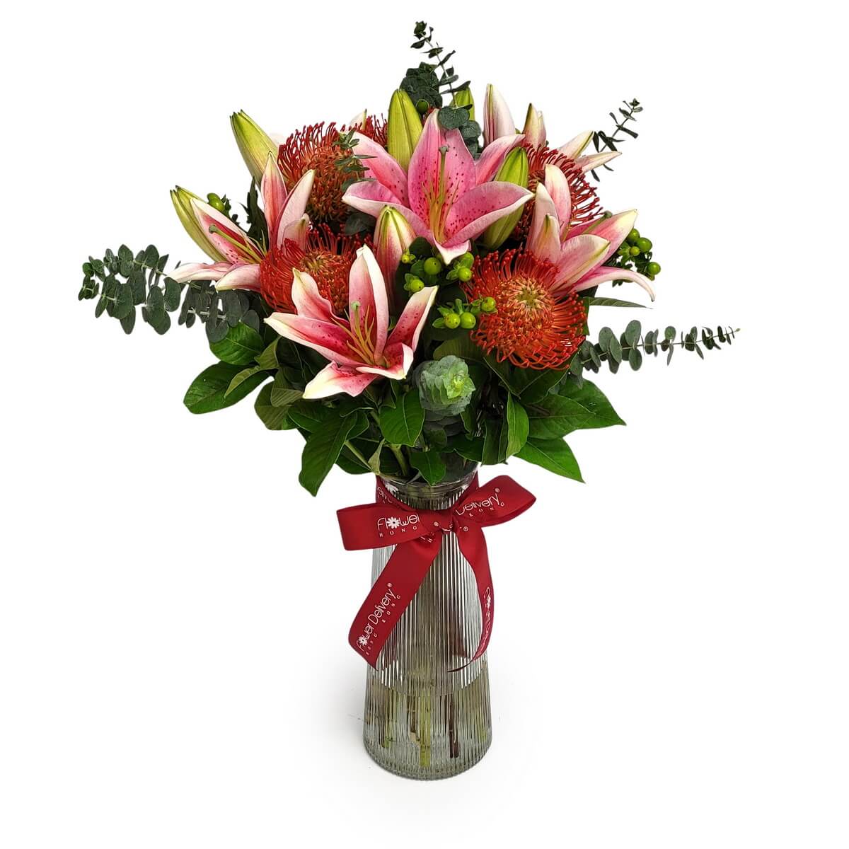 Elegant ribbed glass vase with pink lilies, red pincushion proteas, eucalyptus, and lush greenery 透明條紋玻璃花瓶配粉紅百合紅針墊花及綠葉原相展示.
