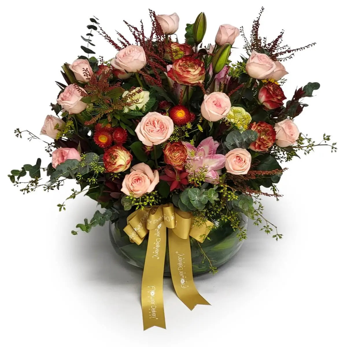 Elegant mix of blush and bicolor roses, lilies, strawflowers, and assorted foliage in a round glass vase | 圓形玻璃花瓶盛載粉紅玫瑰、雙色花園玫瑰、粉百合與太陽花,綠葉豐盈圍繞,層次分明。