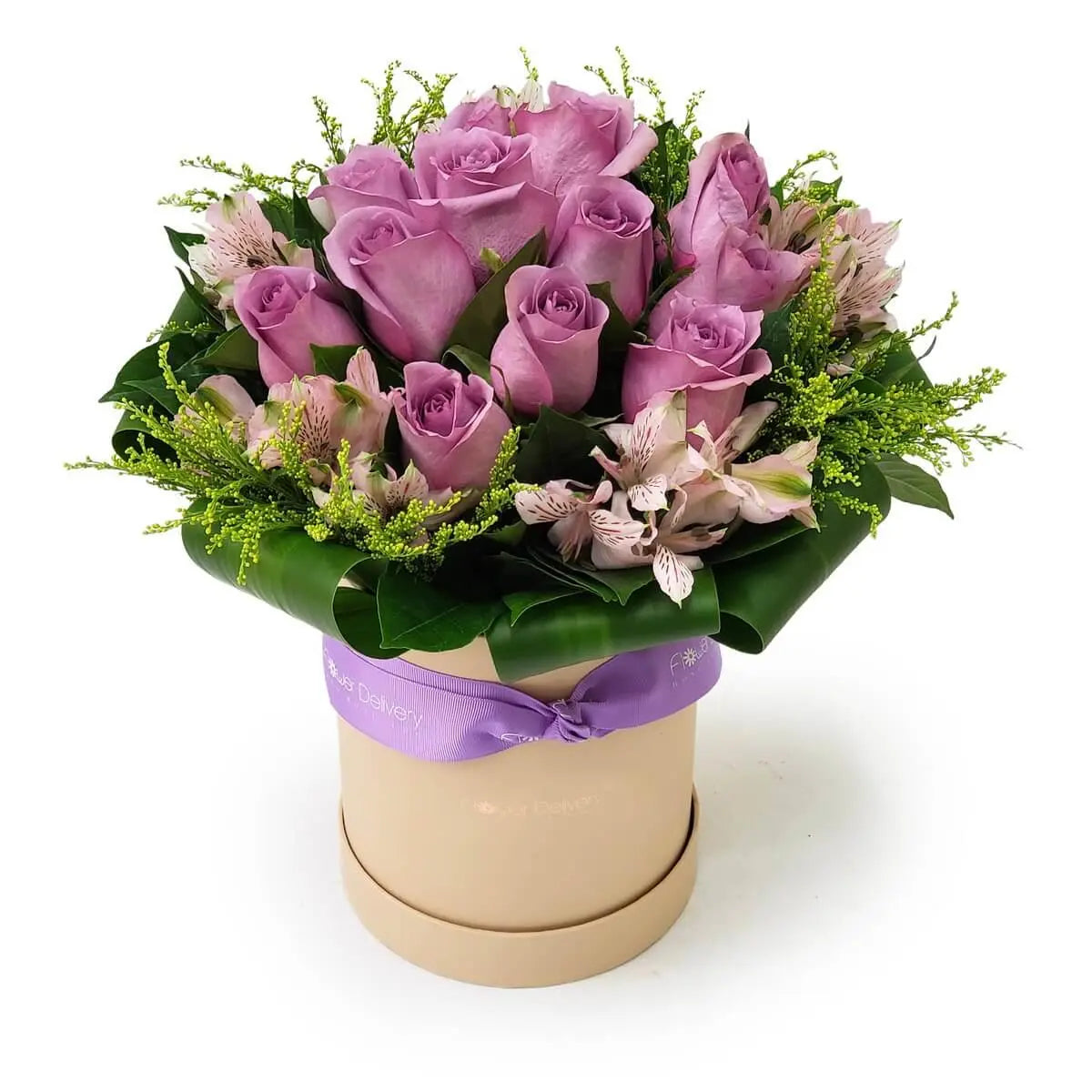 Arrangement of lavender roses, pink alstroemeria, and greenery in beige round hatbox tied with purple ribbon | 淡紫玫瑰、粉紅百合花及綠葉配草圍繞,米色圓盒包裝並綁紫色絲帶