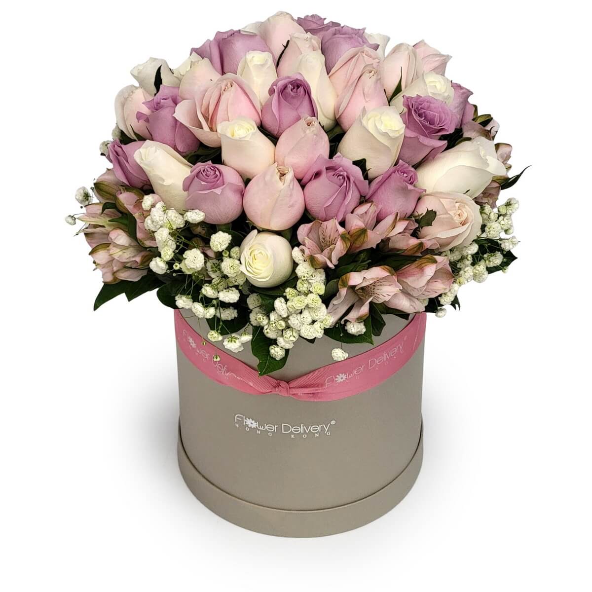 Elegant boxed floral arrangement featuring pastel roses in blush, ivory, and lavender, surrounded by baby’s breath and pink alstroemeria - 精緻花盒裝飾以柔粉、米白及淡紫玫瑰,搭配滿天星與粉色六出花點綴