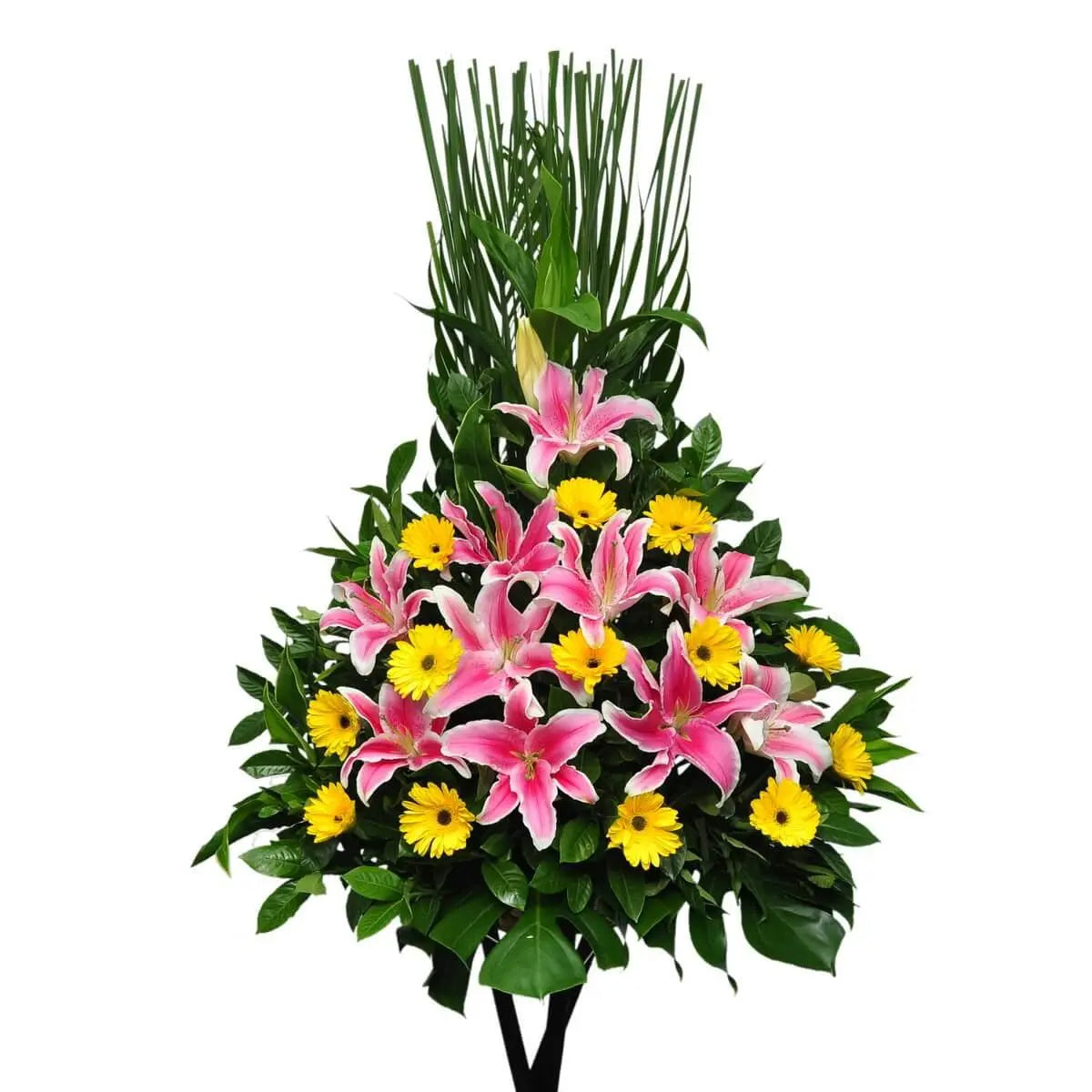 Elegant floral stand featuring pink stargazer lilies and yellow gerbera daisies, arranged with rich tropical greens | 立體花籃由粉紅百合與黃色非洲菊構成,搭配熱帶葉材,整體層次分明,色彩對比鮮明。
