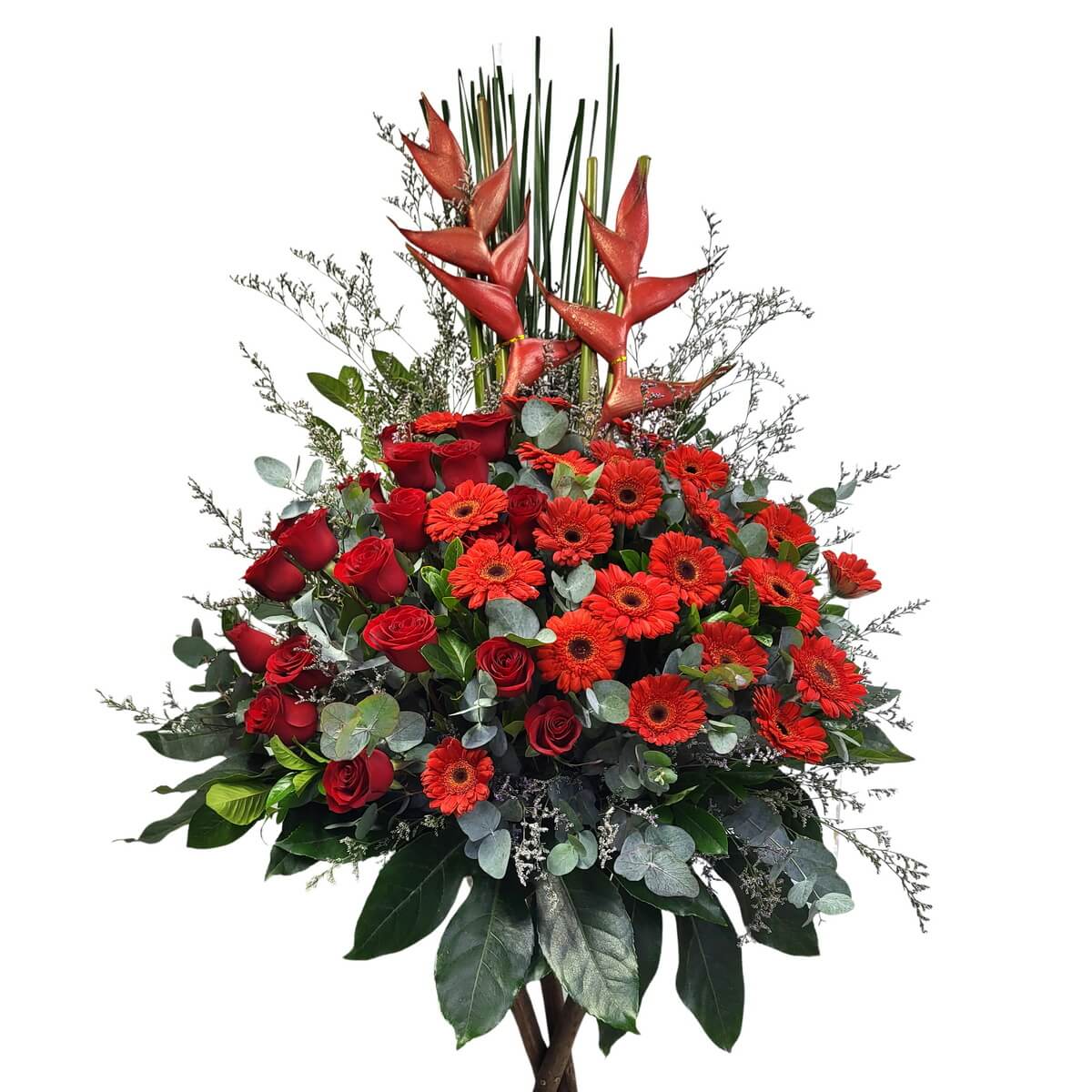 Floral stand featuring red roses, red gerberas, and heliconias arranged with eucalyptus, leatherleaf fern, and accent filler foliage - 紅玫瑰、紅扶郎及赫蕉組成花牌,搭配尤加利、蕨葉與襯葉裝飾