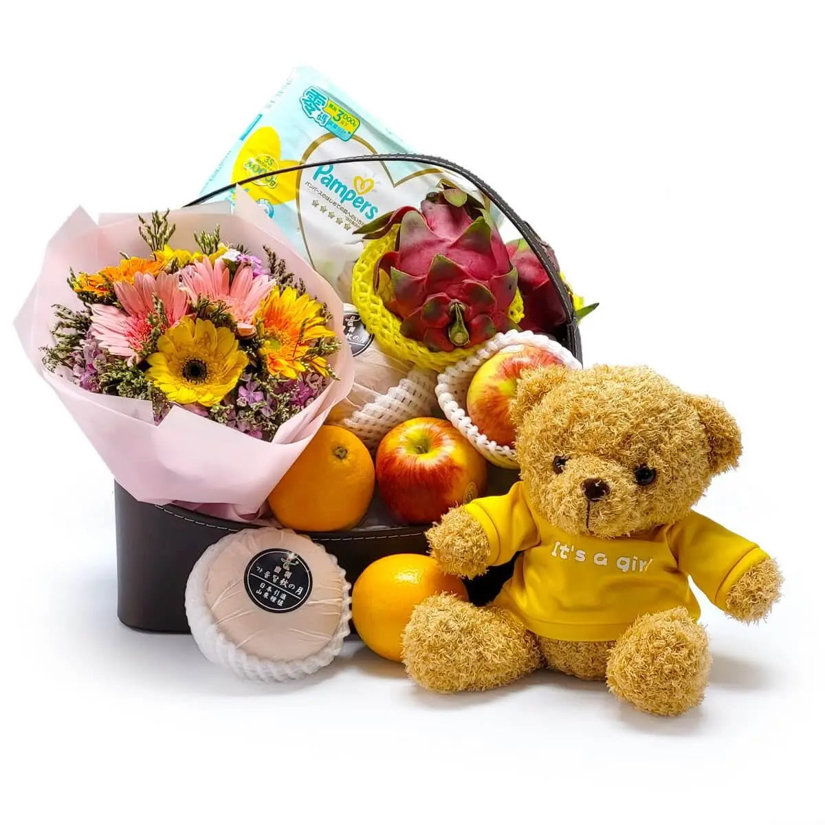 Newborn girl gift hamper with teddy bear in yellow shirt, assorted fruits, pink gerbera bouquet, and Pampers diapers - 女嬰禮籃內含黃色 “It’s a girl” 小熊、粉紅非洲菊花束、蘋果、橙、火龍果與幫寶適尿片,禮籃設計溫馨實用。