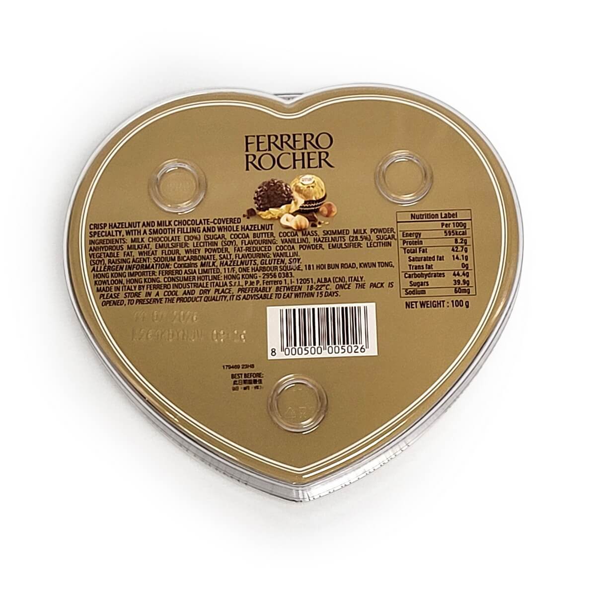 Back view of heart-shaped Ferrero Rocher chocolate box with barcode, ingredients list, and nutritional label on a metallic gold surface. 費列羅心形金盒背面含條碼、成分與營養標籤
