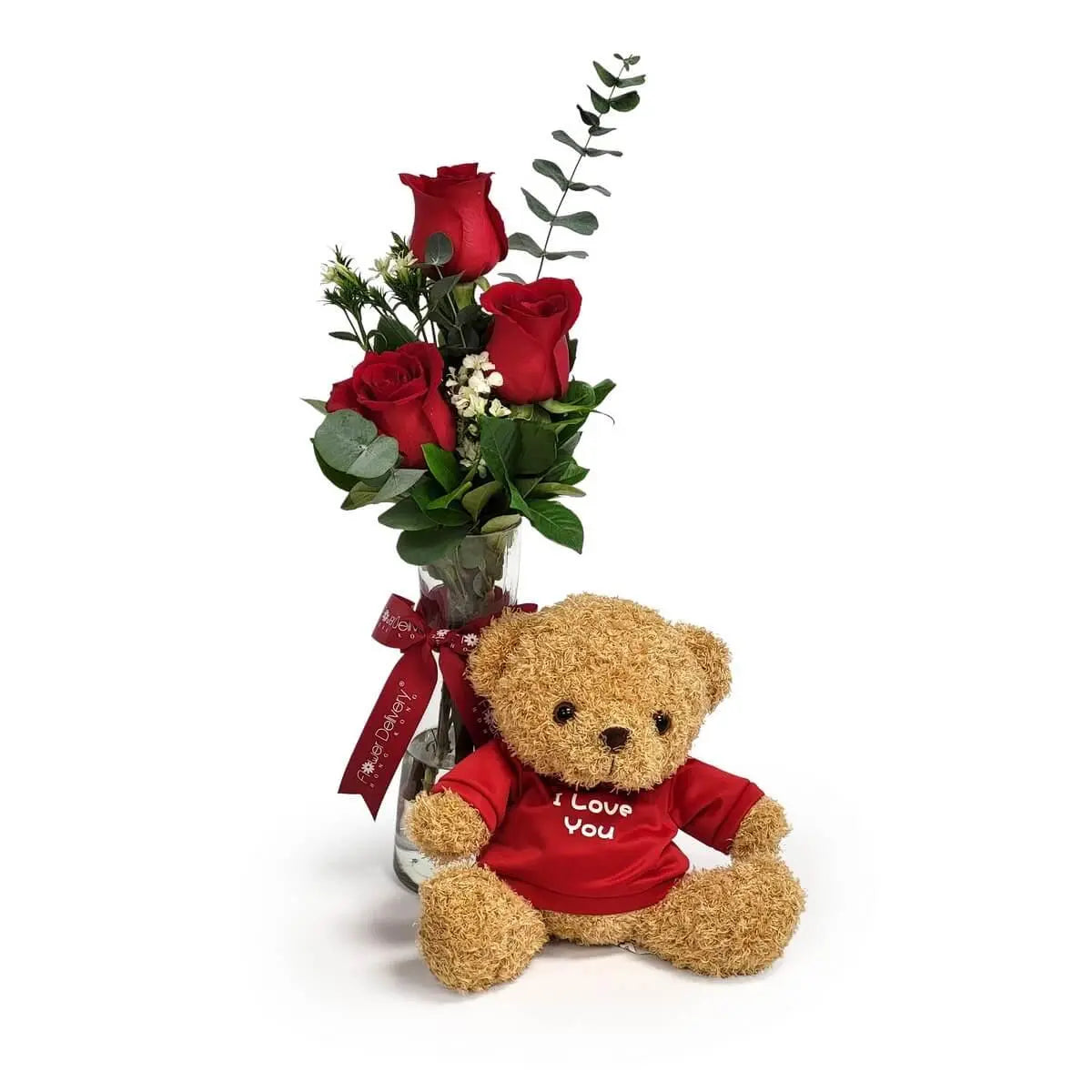 Glass vase arrangement of red roses with greenery and red ribbon, accompanied by a brown teddy bear in a red “I Love You” T-shirt. 紅玫瑰襯綠葉插於玻璃瓶內,配紅色絲帶裝飾,附啡色絨毛熊公仔,穿紅色「I Love You」字樣T恤。