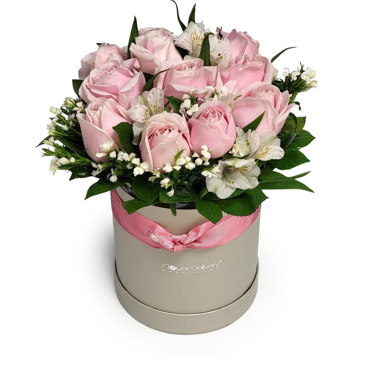 Arrangement of blush pink roses, white alstroemeria, and dainty white filler blooms in a cream round box with a pink ribbon | 奶油色圓形花盒內配搭粉紅玫瑰、白色六出花及細緻白色配花,粉紅絲帶作點綴。