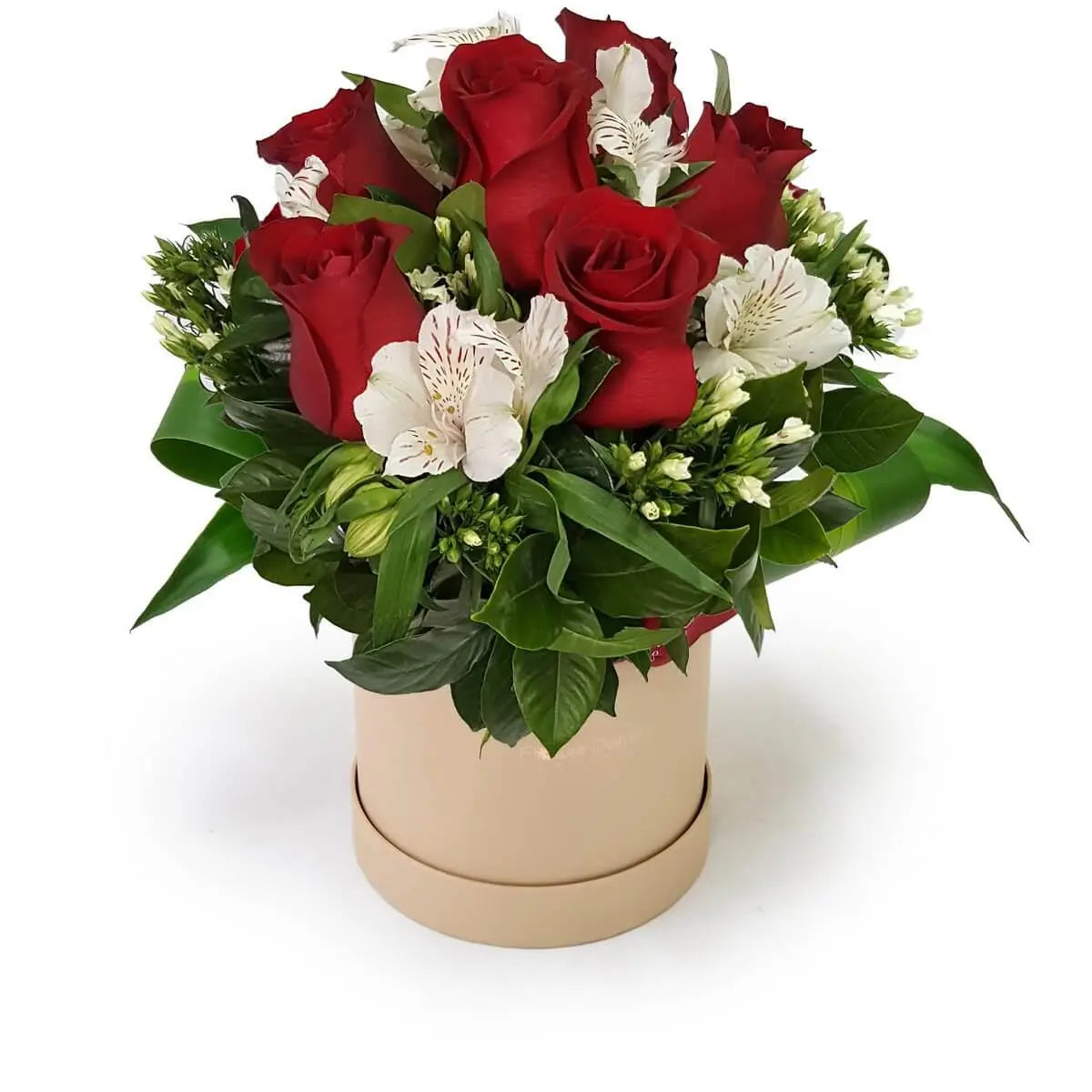 Arrangement of red roses and white alstroemeria with greenery in a beige round box. | 紅玫瑰搭配白色六出花及綠葉,設於米色圓形花盒中,造型典雅。