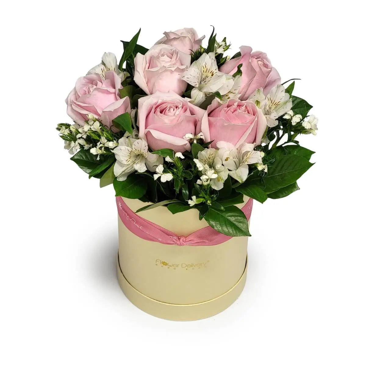 Arrangement of pink roses, white alstroemeria, filler blooms, and foliage in a cream round hatbox | 米白圓形花盒內飾有粉紅玫瑰、白色百合花、小白花與青綠葉材,構成清雅花藝設計
