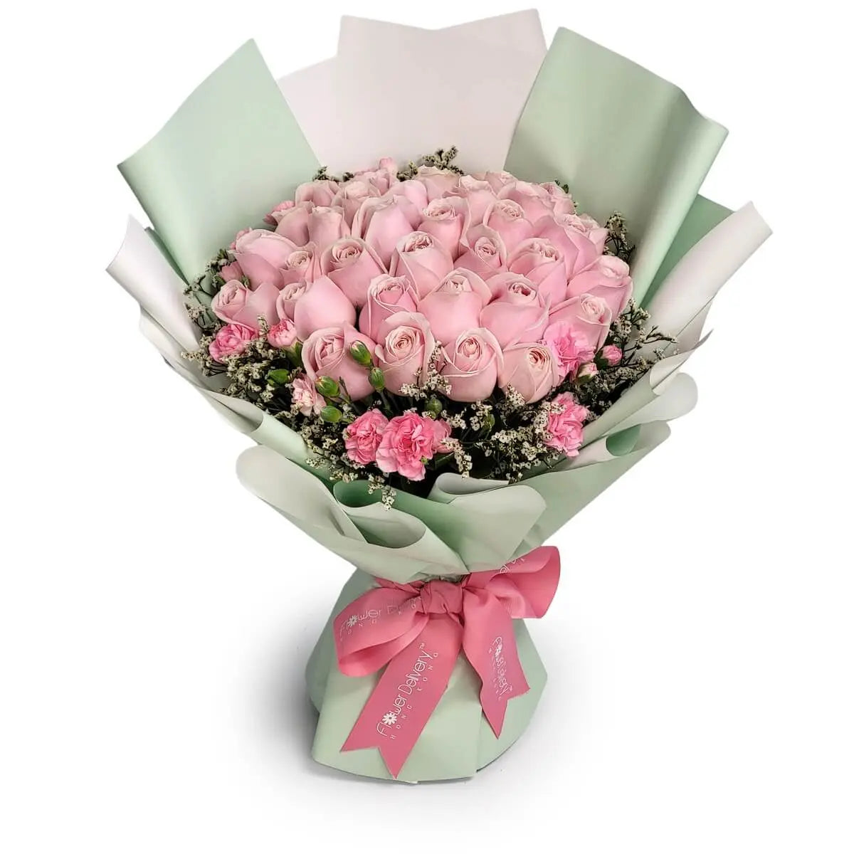 Rounded bouquet of soft pink roses accented with pink carnations and white filler blooms, wrapped in mint-white paper and tied with a pink ribbon | 圓形花束以淡粉玫瑰為主,點綴粉紅康乃馨及白色配花,襯以薄荷綠白雙色包裝紙與粉紅緞帶。