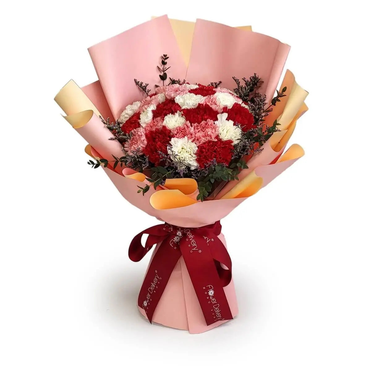 Mix of red, white, and pink carnations accented with green foliage in a peach-orange wrap | 紅、白、粉康乃馨混合搭配綠葉,配桃橙雙層包裝紙及紅絲帶裝飾