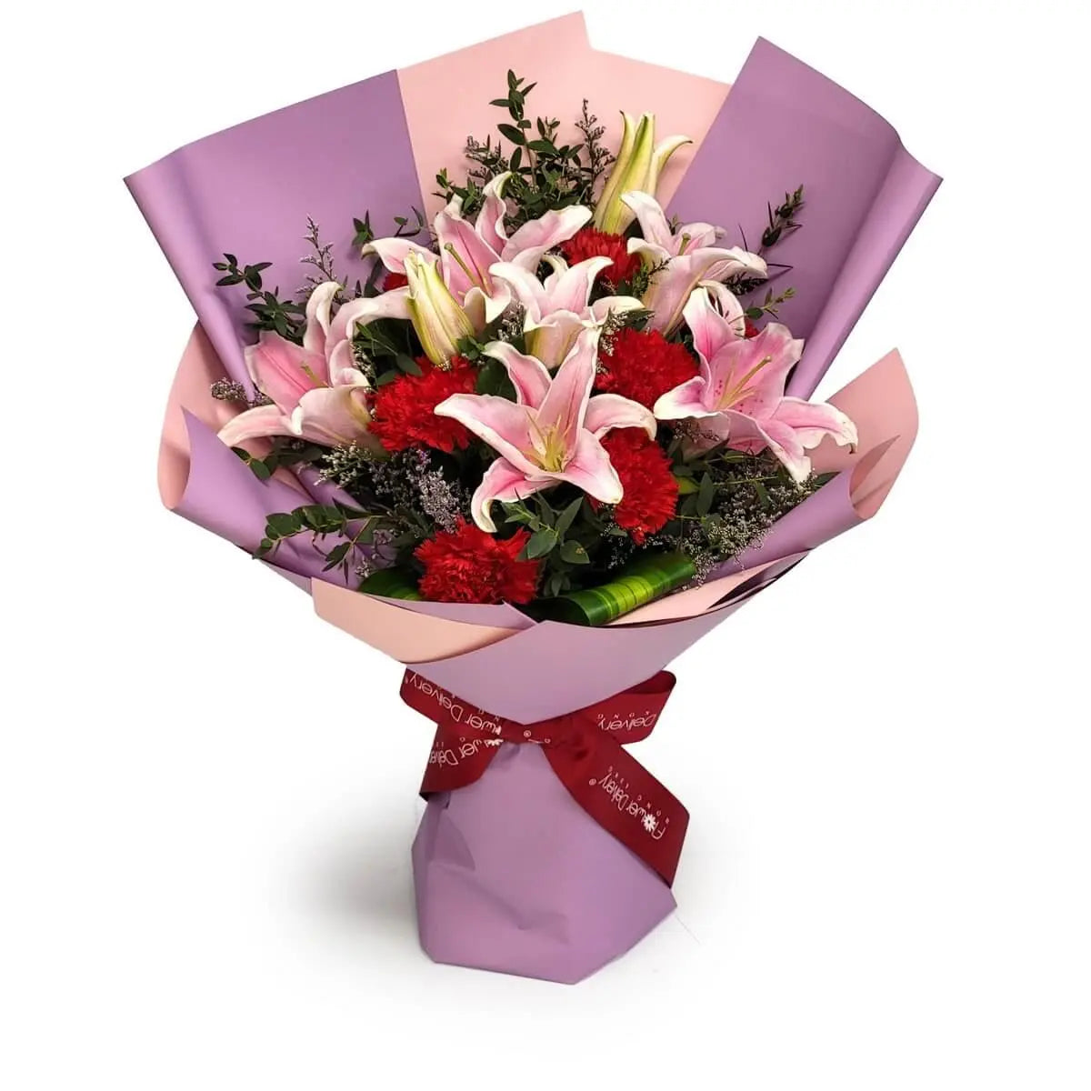 Hand-tied bouquet of pink lilies and red carnations, accented with greenery and purple fillers, wrapped in dual-tone paper | 粉紅百合與紅康乃馨手紮花束,配綠葉與紫色配花,雙色包裝紙設計。