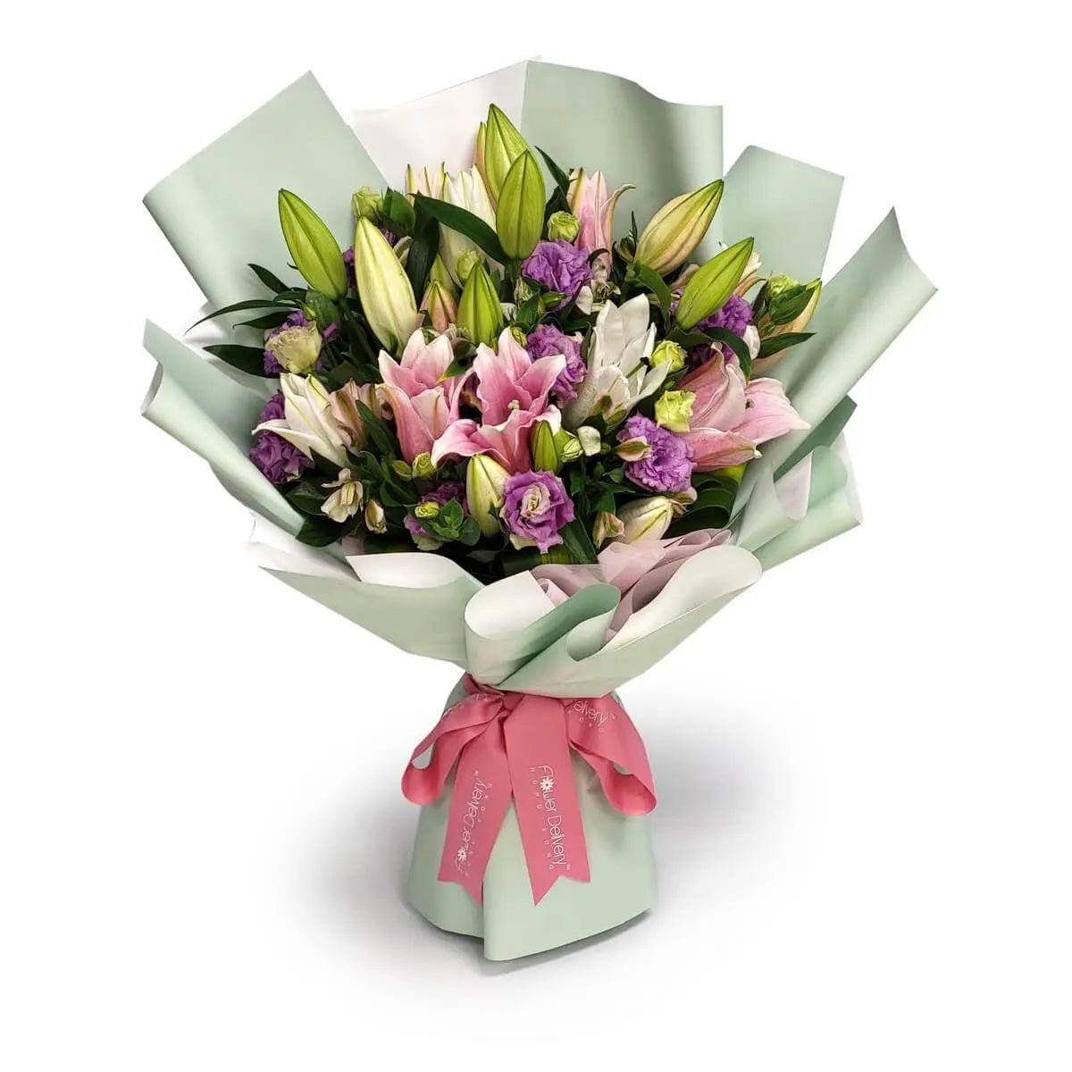 Mixed bouquet of pink and white lilies, purple lisianthus, and fresh buds, wrapped in mint green and white paper with a soft pink ribbon | 粉白百合、紫桔梗與花苞組合，薄荷綠及白色包裝紙襯托，綁上粉紅絲帶，花材豐富層次感強。