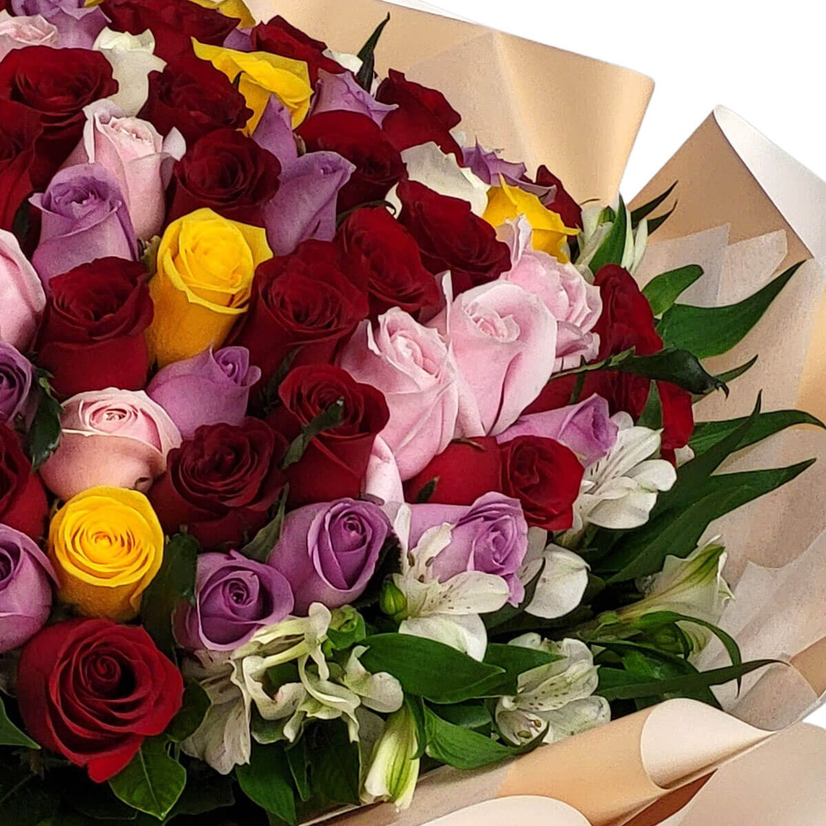 A stunning bouquet blending red, pink, yellow, and lavender roses with white lilies, wrapped in beige 紅、粉、黃、紫玫瑰繽紛匯聚，點綴白百合與綠葉，米色包裝襯托高雅氣質。