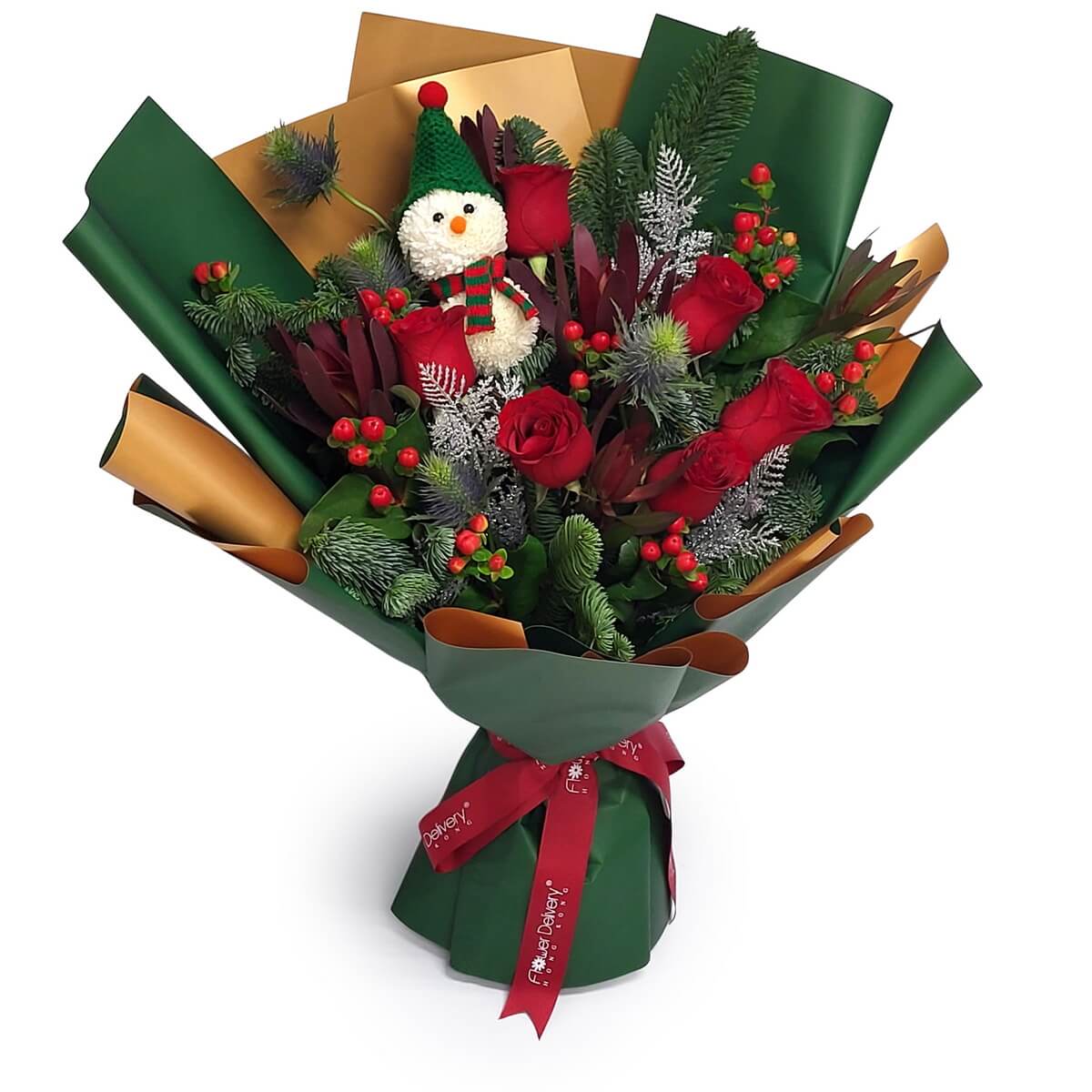 Festive hand wrapped Christmas bouquet showing red roses, pine foliage, thistle texture and red berries in a full arrangement. 聖誕紅玫瑰花束，配松葉、薊花質感及紅色漿果