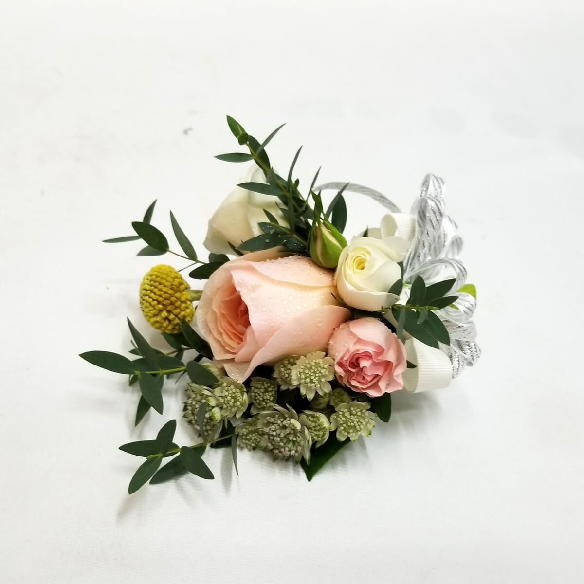 original photo of boutonniere with peach and white roses, yellow craspedia, astrantia, and silver ribbon - 桃白玫瑰、黃球菊、翠珠花及銀色絲帶襟花