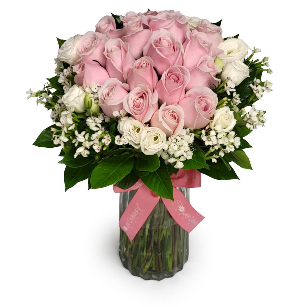 Soft pink roses surrounded by white lisianthus and waxflowers, arranged in a glass vase with a pink ribbon - 粉紅玫瑰環繞白色洋桔梗與蠟花，整齊排列於玻璃花瓶中，繫上粉紅絲帶。