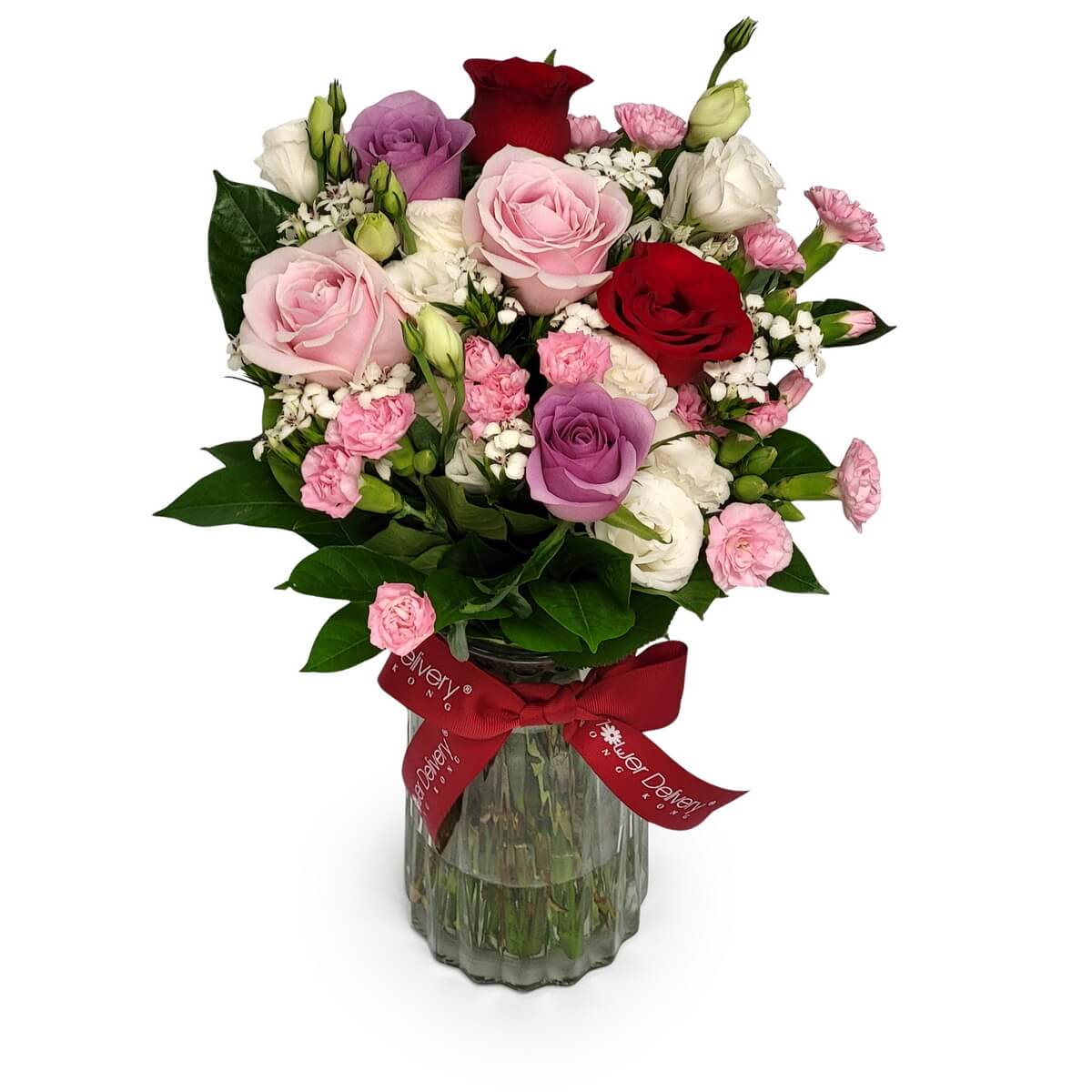Mixed roses, lisianthus, and mini carnations in vase - 玻璃花瓶內有粉紅、紫色、紅色及白玫瑰，配洋桔梗及迷你康乃馨。