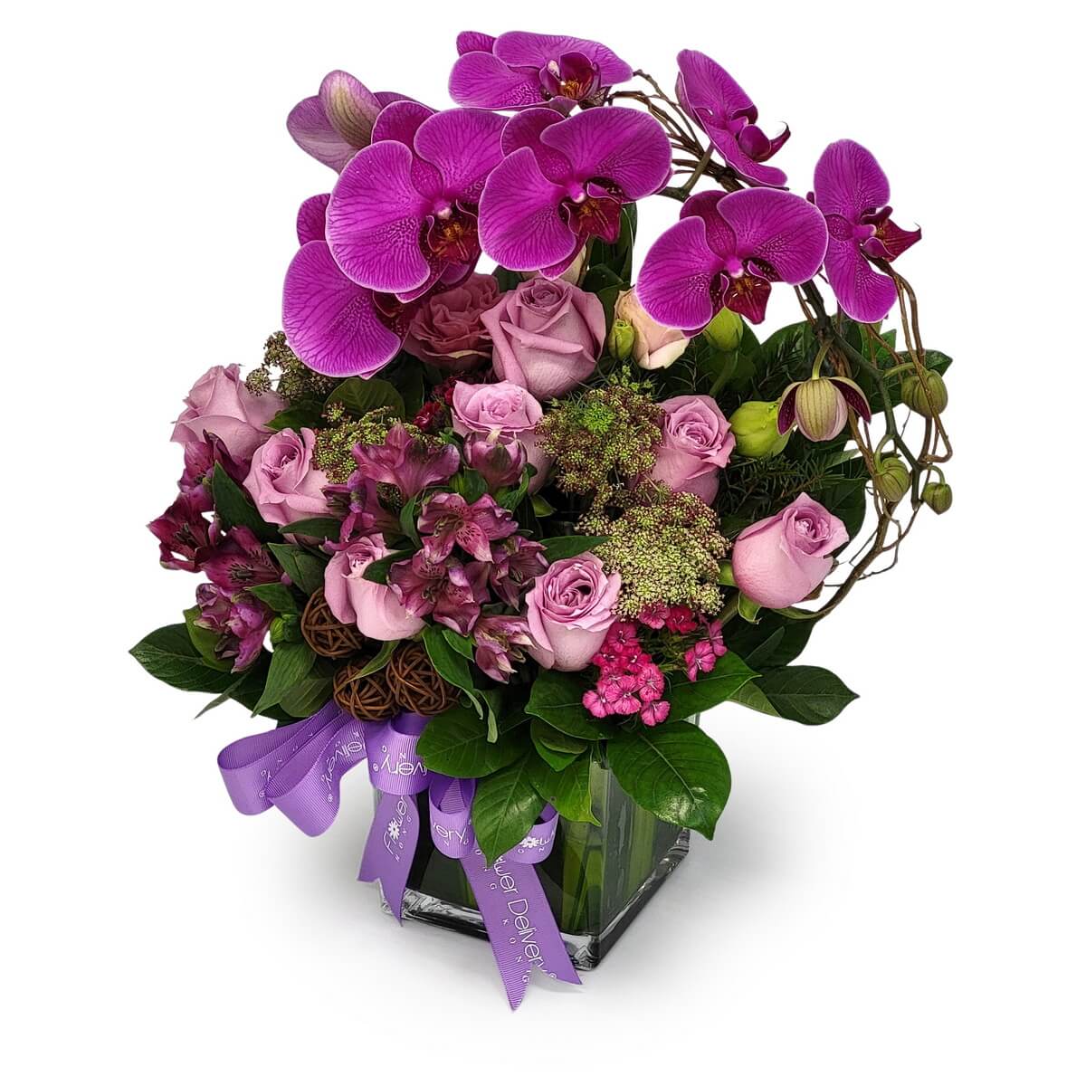 Elegant arrangement of purple phalaenopsis orchids, lavender roses and alstroemeria in a square glass vase with green foliage - 紫色蝴蝶蘭、薰衣草玫瑰及小百合配綠葉玻璃花瓶設計
