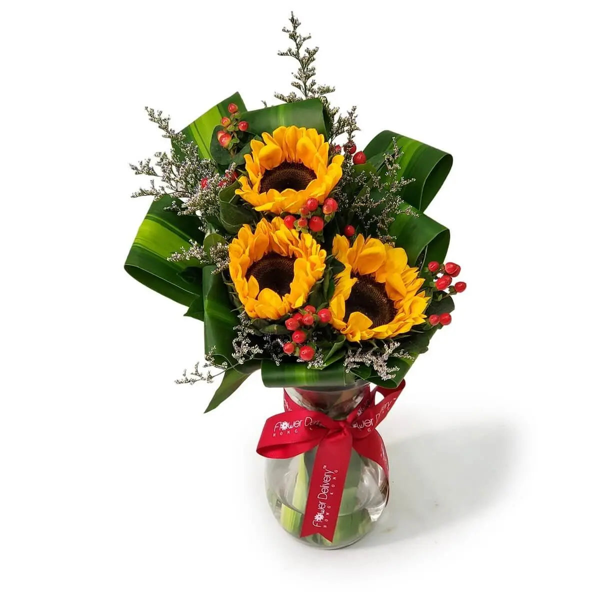 Vase arrangement with three sunflowers, red hypericum berries, white limonium, and folded green foliage tied with red ribbon | 三朵向日葵配紅色高山莓、白色星辰花及摺葉，綁以紅絲帶，插於花瓶中