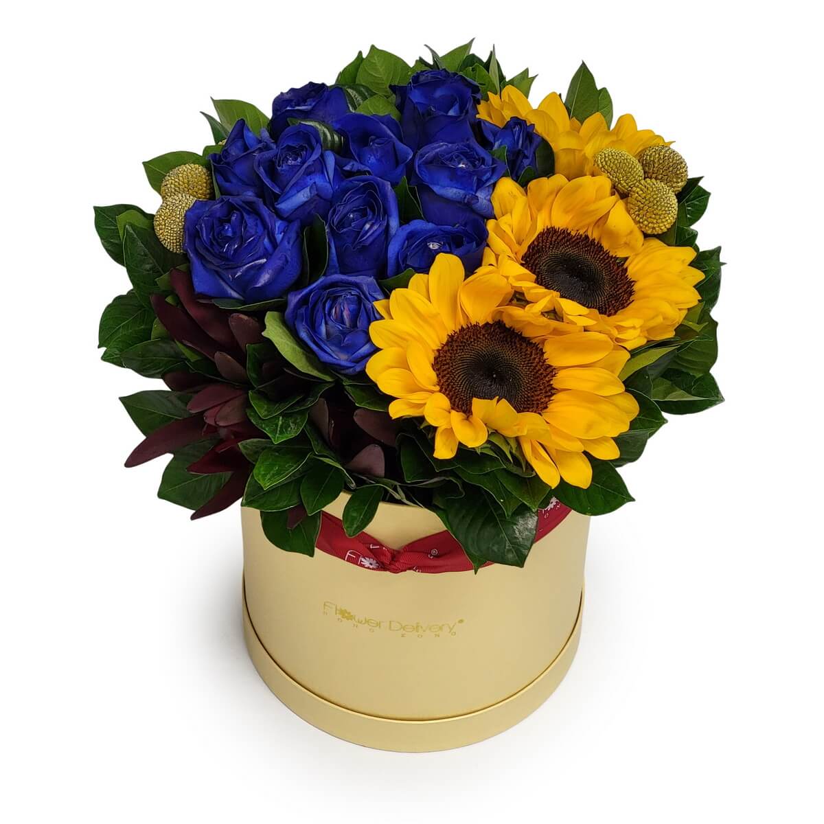 Full hatbox arrangement featuring blue roses, sunflowers, billy buttons, deep foliage and lush greens in original photo 花盒含深藍玫瑰、向日葵、乒乓狀小花及深色綠葉的完整作品