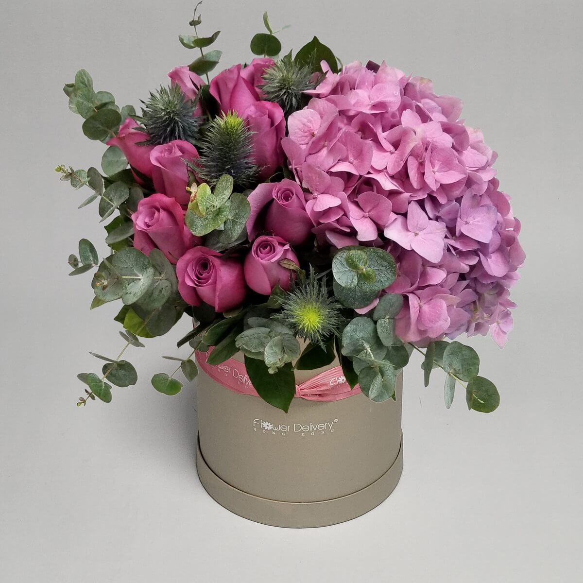 Original photo of pink hydrangea with pink roses, eucalyptus and thistle in round hatbox arrangement - 粉紅繡球配粉紅玫瑰及尤加利圓帽盒花藝
