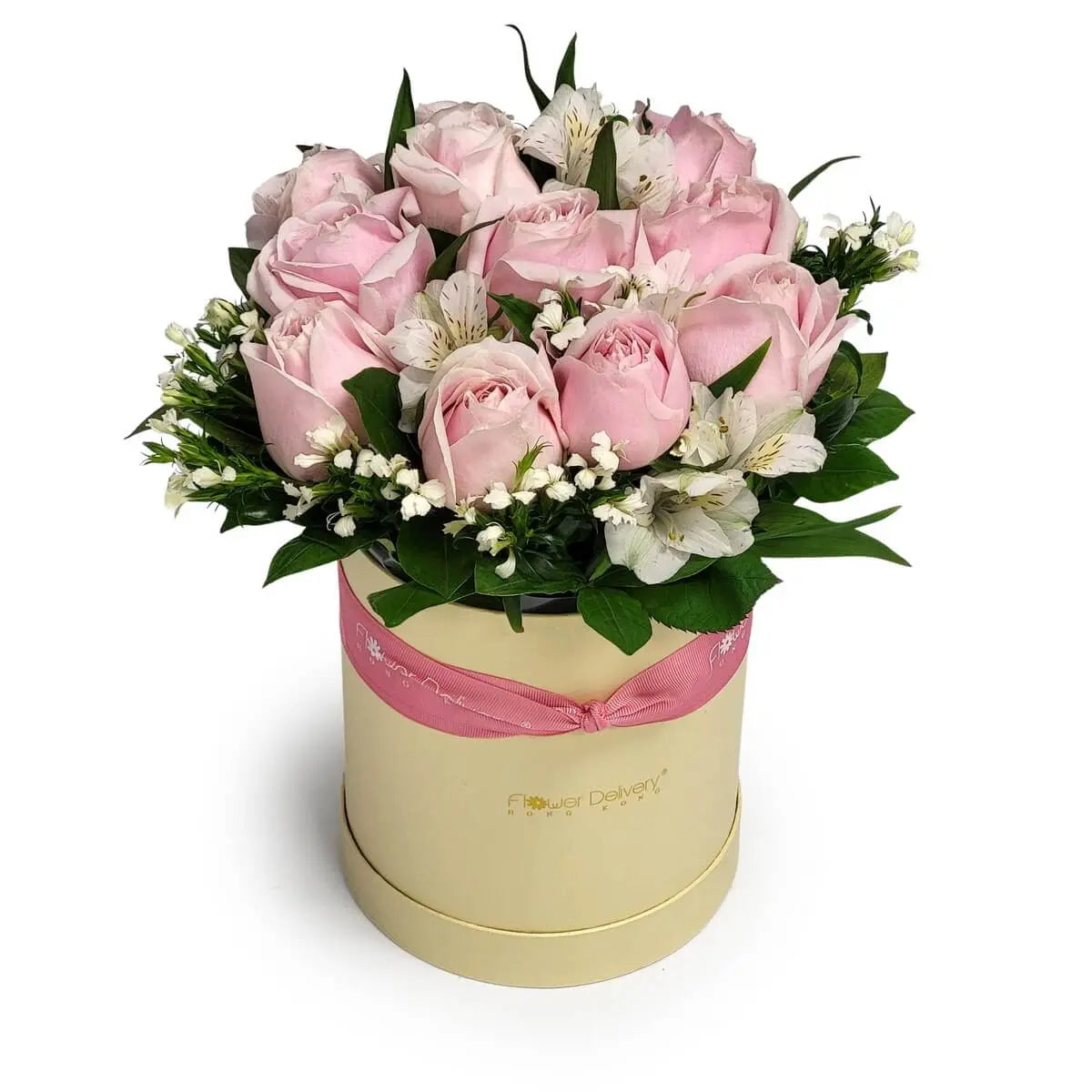 Arrangement of blush pink roses, white alstroemeria, and dainty white filler blooms in a cream round box with a pink ribbon | 奶油色圓形花盒內配搭粉紅玫瑰、白色六出花及細緻白色配花，粉紅絲帶作點綴。