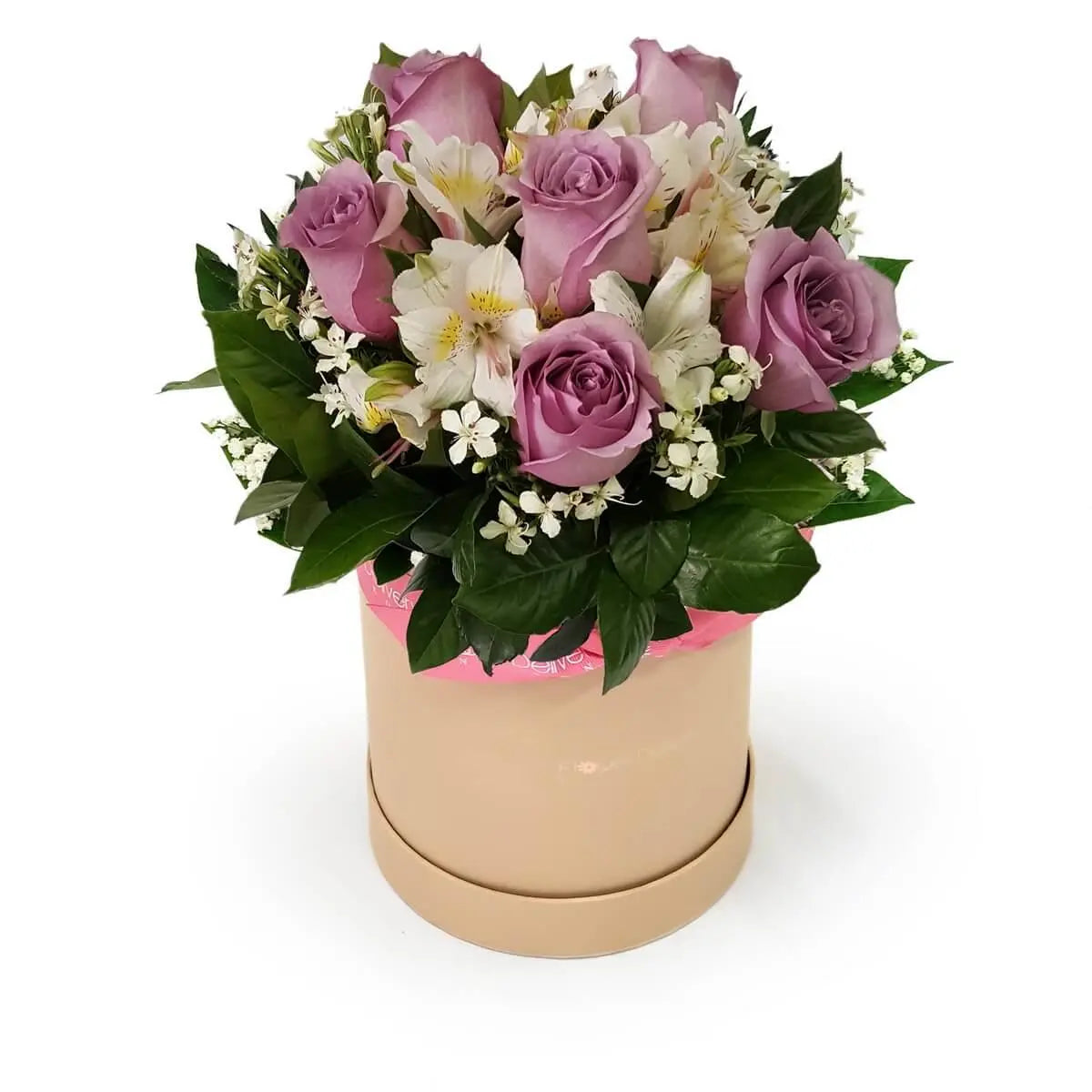 Arrangement of lavender roses, white alstroemeria, and small white filler flowers with greenery in round box. 圓形禮盒設計，含淡紫玫瑰、白色六出花及白色襯花，配搭濃綠葉材。