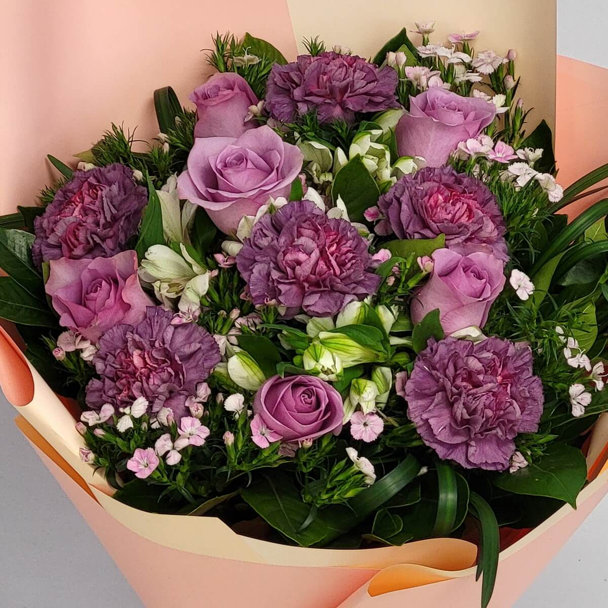 Purple roses and carnations bouquet with white alstroemeria and pink waxflowers, peach cream wrapping and purple ribbon - 紫色玫瑰及康乃馨花束，配白色六出花及粉紅色蠟花，蜜桃奶油色包裝及紫色緞帶